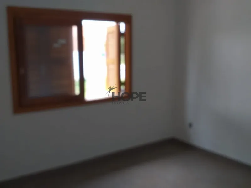 Casa com dois dormitórios e um suíte a venda em bairro de Xangri-lá: 3ª foto da galeria de imagens do imóvel