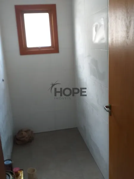 Casa com dois dormitórios e um suíte a venda em bairro de Xangri-lá: 2ª foto da galeria de imagens do imóvel