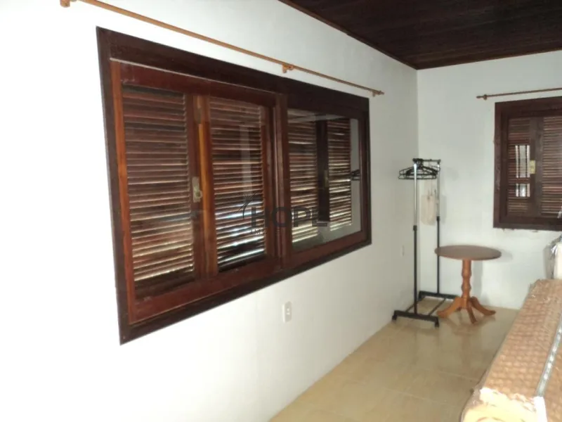 Casa a venda com 4 dormitorios em bairro de Xangri-lá: 2ª foto da galeria de imagens do imóvel