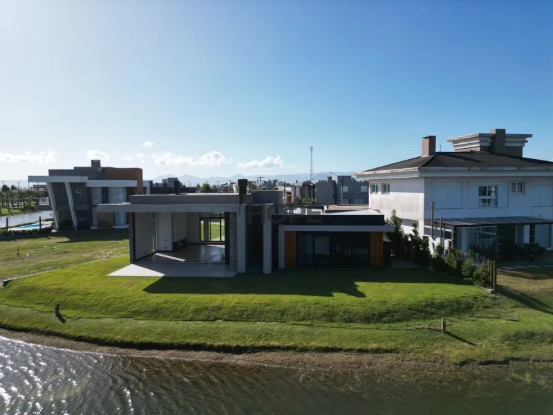 CASA COMPOSTA POR 4 SUÍTES EM CONDOMÍNIO DE XANGRI-LÁ!: 3ª foto da galeria de imagens do imóvel