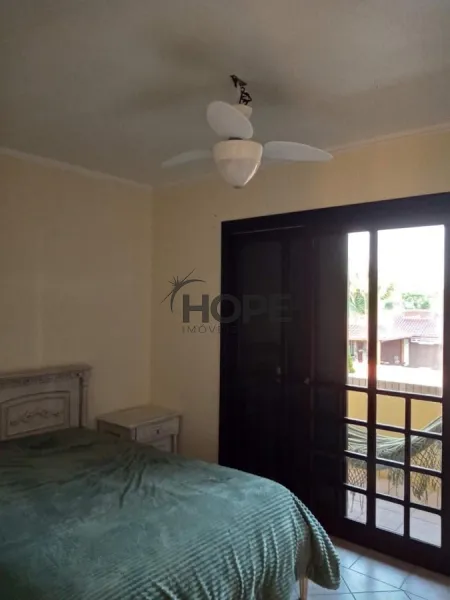 Sobrado com 4 dormitórios em bairro de Capão da Canoa: 16ª foto da galeria de imagens do imóvel