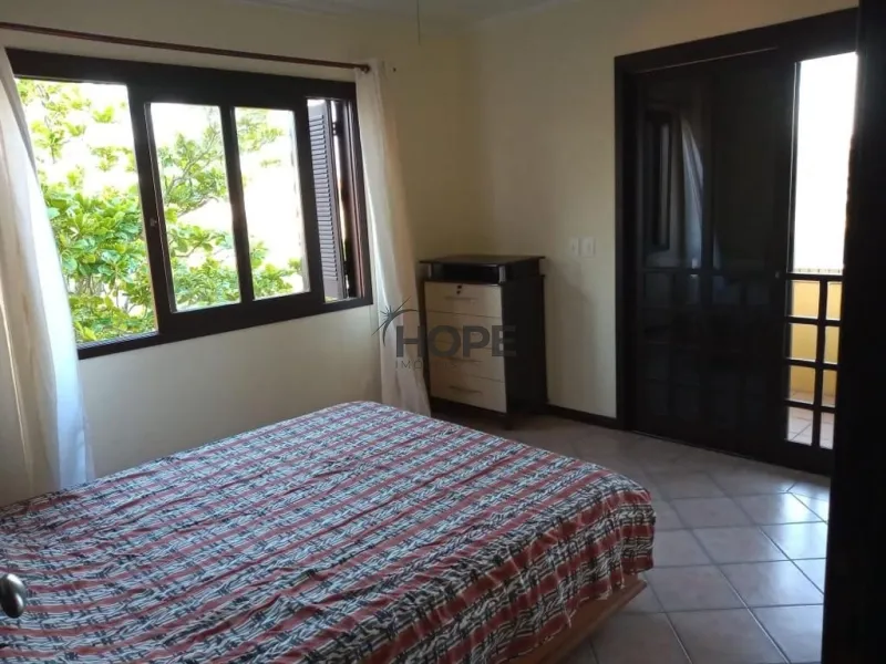 Sobrado com 4 dormitórios em bairro de Capão da Canoa: 10ª foto da galeria de imagens do imóvel