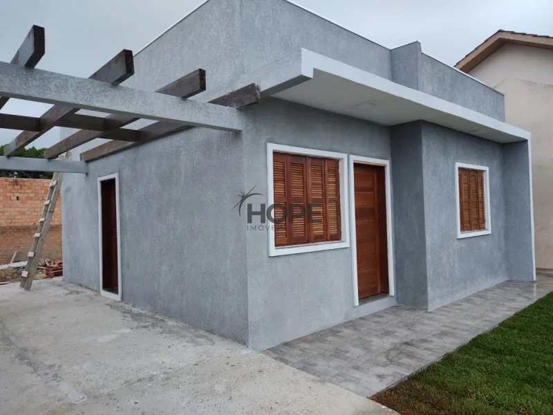 Casa com 2 dormitórios, sendo um suíte em bairro de Capão da Canoa: 5ª foto da galeria de imagens do imóvel