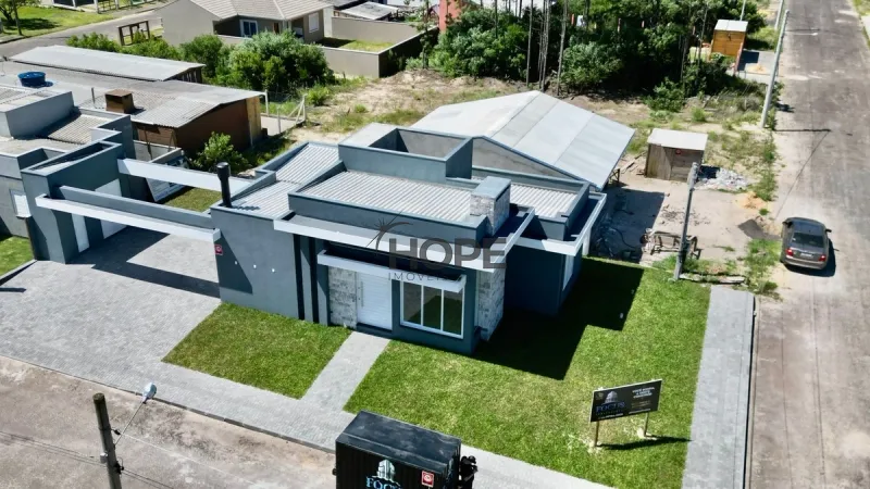 Casa com 3 dormitórios, sendo um suíte em bairro de Capão da Canoa: 7ª foto da galeria de imagens do imóvel