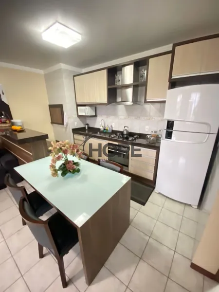 Casa com 4 dormitórios em Capão da Canoa: 2ª foto da galeria de imagens do imóvel