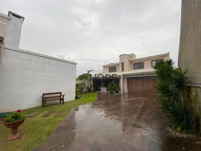 Casa com 4 dormitórios em Capão da Canoa: 9ª foto da galeria de imagens do imóvel