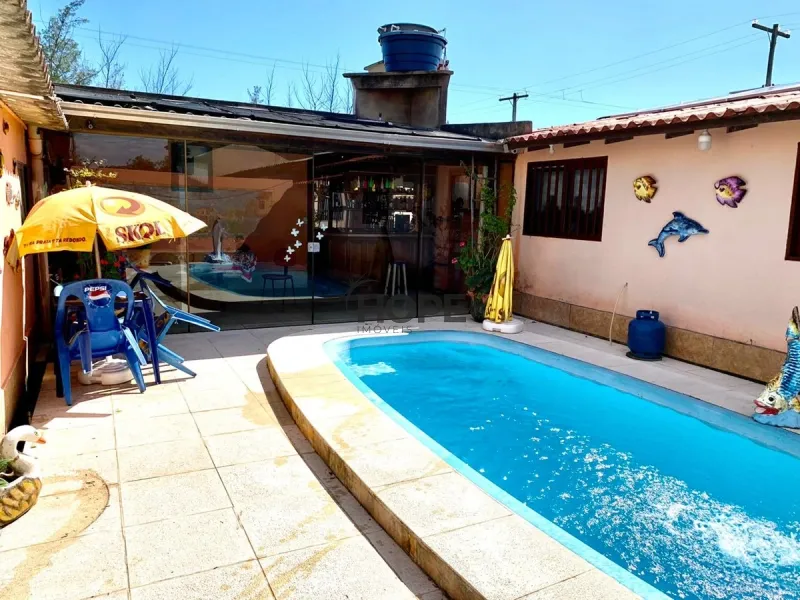 Casa ampla com piscina em Capão da Canoa: 5ª foto da galeria de imagens do imóvel