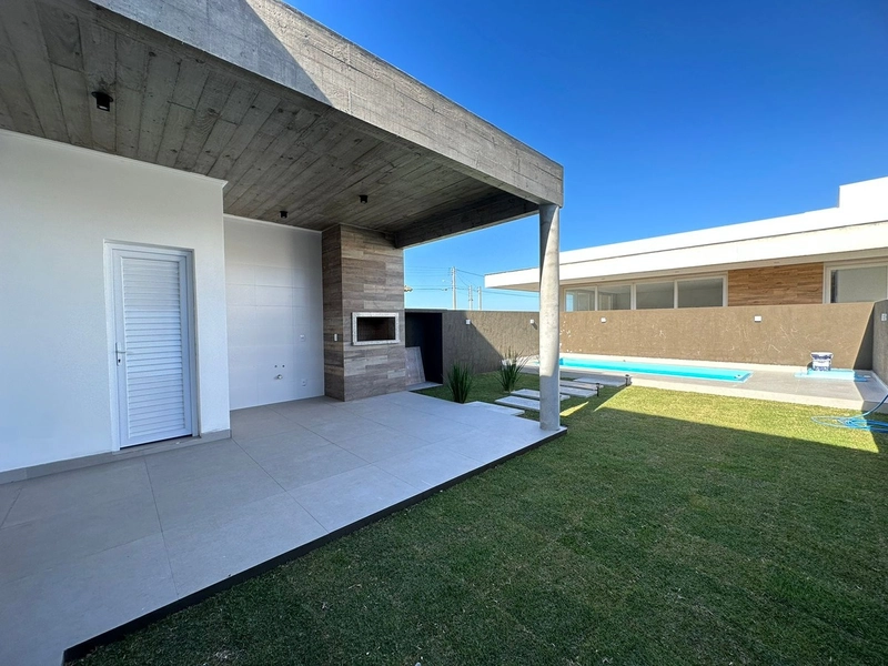 Sobrado com 4 dormitórios, sendo 3 suítes em Capão da Canoa: 13ª foto da galeria de imagens do imóvel