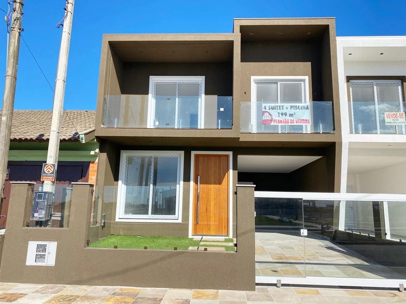 Sobrado com 4 dormitórios, sendo 3 suítes em Capão da Canoa: 3ª foto da galeria de imagens do imóvel