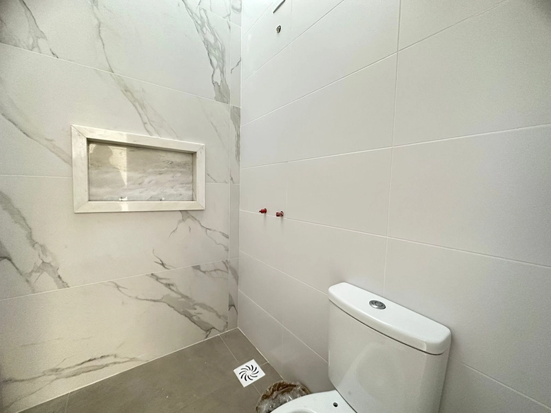 Sobrado com 4 dormitórios, sendo 3 suítes em Capão da Canoa: 9ª foto da galeria de imagens do imóvel