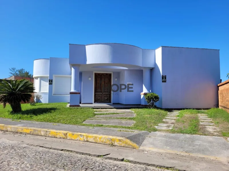 Casa em Atlântida com 3 suítes, sendo uma master com jardim provativo: 2ª foto da galeria de imagens do imóvel