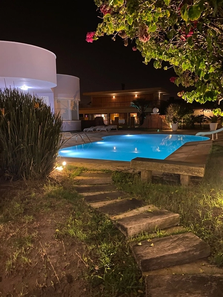 Casa em Atlântida com 3 suítes, sendo uma master com jardim provativo: 13ª foto da galeria de imagens do imóvel