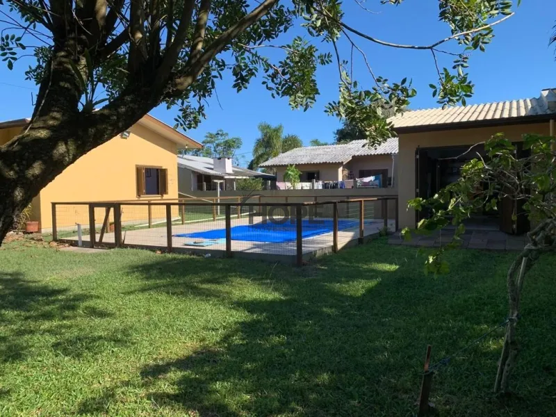 Casa com 3 dormitórios, sendo uma suíte em bairro de Capão da Canoa: 5ª foto da galeria de imagens do imóvel