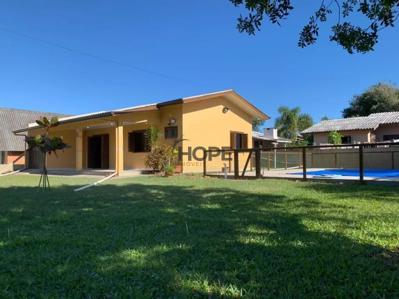 Casa com 3 dormitórios, sendo uma suíte em bairro de Capão da Canoa: 31ª foto da galeria de imagens do imóvel