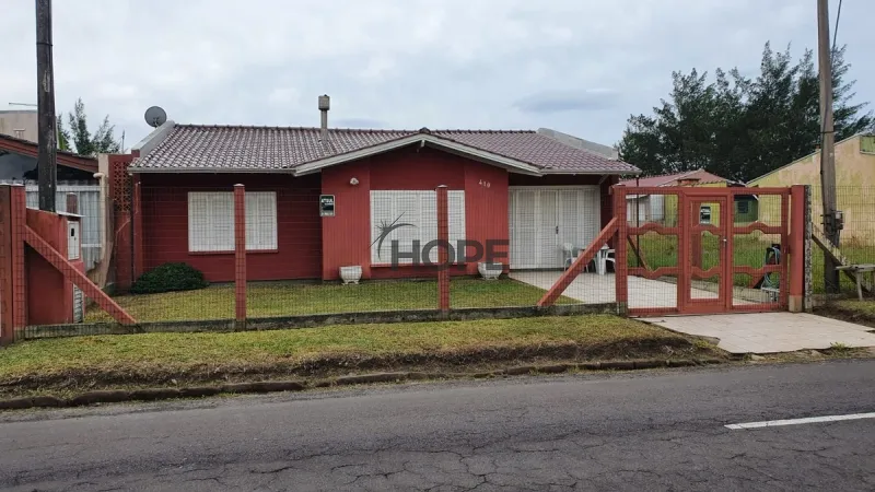 Casa com 4 dormitórios, sendo um suite em Atlantida Sul: 1ª foto da galeria de imagens do imóvel