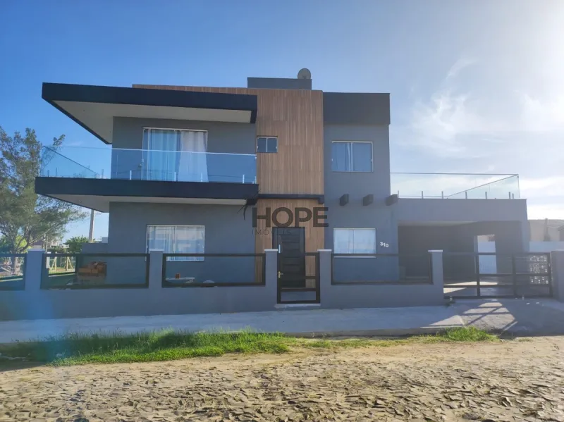 Casa com 4 dormitórios e piscina em Capão da Canoa: 10ª foto da galeria de imagens do imóvel