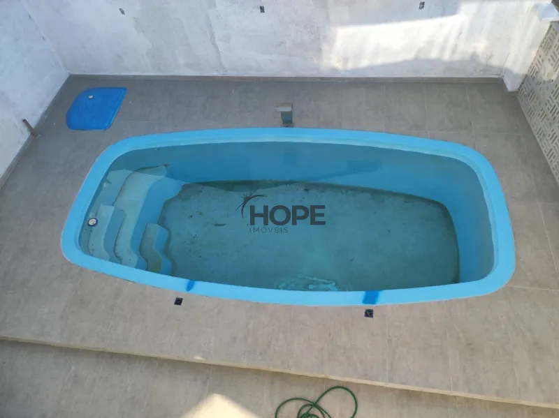 Casa com 4 dormitórios e piscina em Capão da Canoa: 3ª foto da galeria de imagens do imóvel