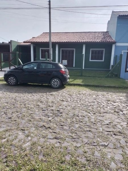 Casa com dois dormitórios em Atlântida Sul: 4ª foto da galeria de imagens do imóvel