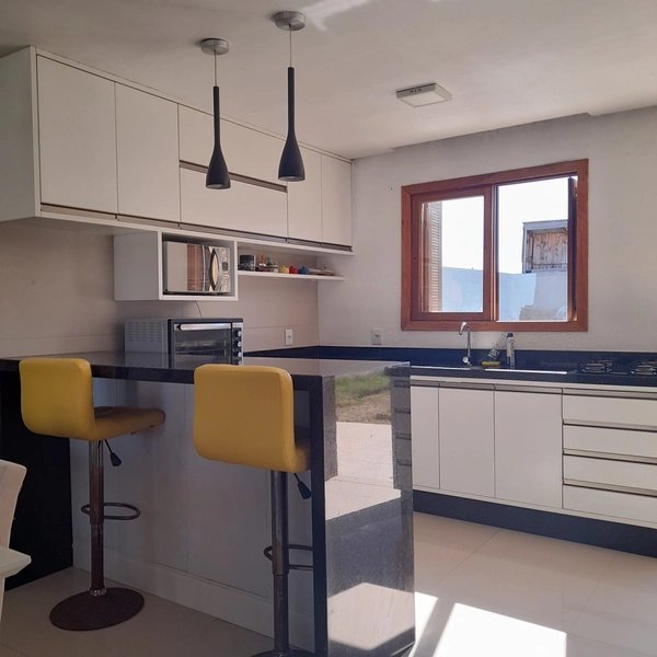 Casa com 2 dormitórios sendo um suíte em praia de Xangri-lá: 3ª foto da galeria de imagens do imóvel