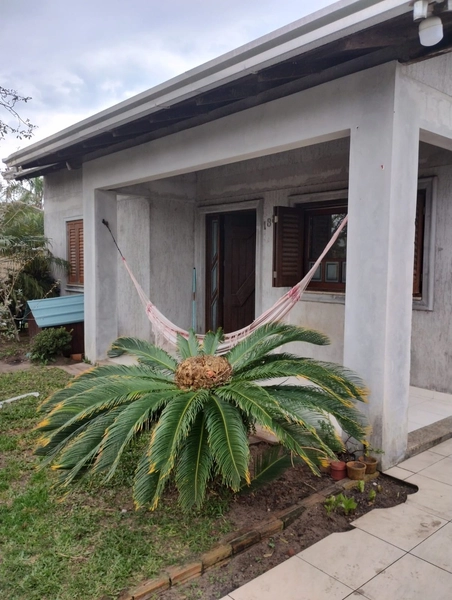 Casa 3 dormitórios em Capão da Canoa: 1ª foto da galeria de imagens do imóvel