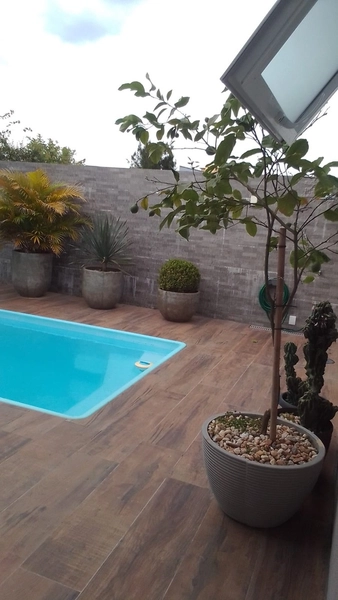 LINDA CASA COM PISCINA E ANEXO À VENDA EM ATLÂNTIDA SUL: 10ª foto da galeria de imagens do imóvel