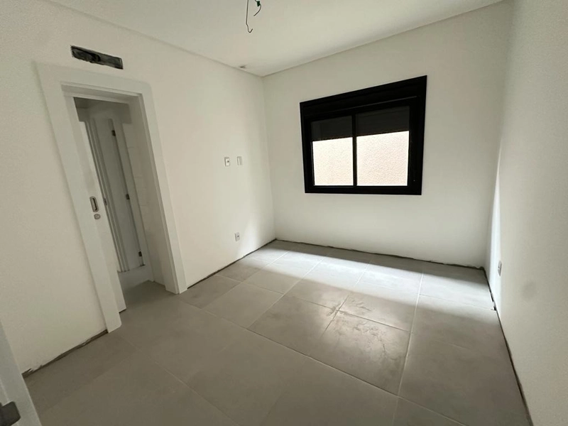 Casa 3 dormitórios sendo 1 suíte americana  em CAPÃO DA CANOA/Zona Nor: 6ª foto da galeria de imagens do imóvel