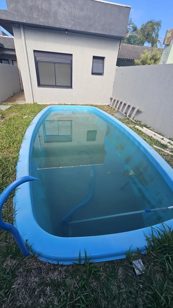 CASA 2 DORMITÓRIOS COM SUÍTE E PISCINA EM XANGRI-LÁ/RAINHA DO MAR: 15ª foto da galeria de imagens do imóvel