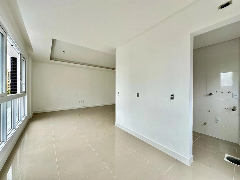 APARTAMENTO COM TERRAÇO EM CAPÃO DA CANOA/CENTRO: 2ª foto da galeria de imagens do imóvel