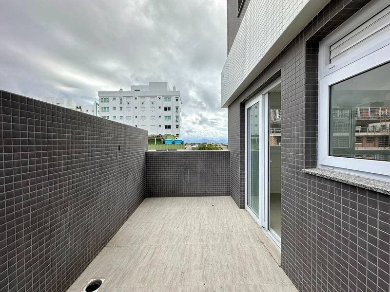 APARTAMENTO COM TERRAÇO EM CAPÃO DA CANOA/CENTRO: 4ª foto da galeria de imagens do imóvel