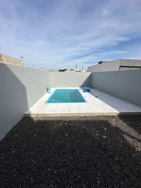 Ótima casa com piscina à venda em Capão da Canoa!: 12ª foto da galeria de imagens do imóvel