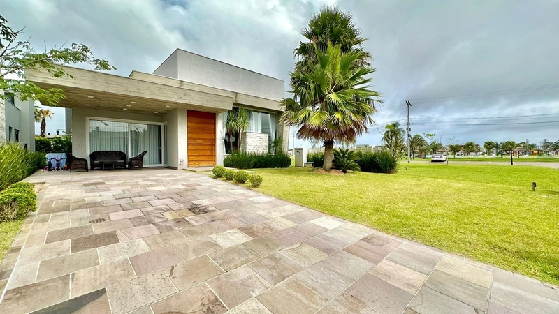 CASA EM CONDOMÍNIO FECHADO EM CAPÃO DA CANOA/ZONA NOVA