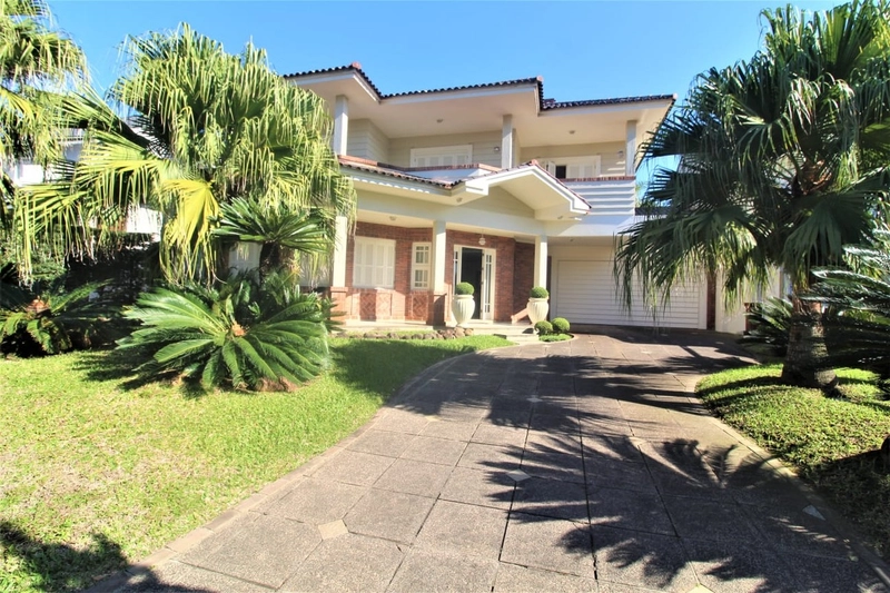 CASA 4 DORMITÓRIOS EM XANGRI-LÁ/ATLÂNTIDA: 1ª foto da galeria de imagens do imóvel