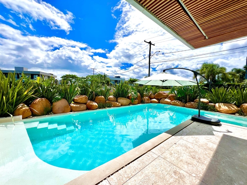 CASA EM CONDOMÍNIO FECHADO EM XANGRI-LÁ: 5ª foto da galeria de imagens do imóvel