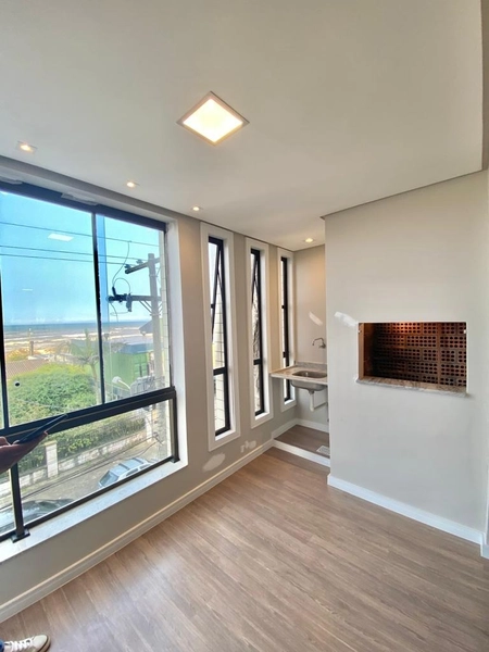 APARTAMENTO DE FRENTE , VISTA MAR EM CAPÃO DA CANOA/CENTRO: 1ª foto da galeria de imagens do imóvel