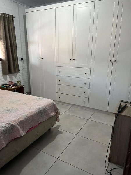 Casa estilo cabana à venda em Capão da Canoa!: 4ª foto da galeria de imagens do imóvel