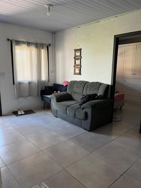 Casa estilo cabana à venda em Capão da Canoa!: 2ª foto da galeria de imagens do imóvel