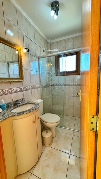 APARTAMENTO 2 DORMITÓRIOS COM SACADA EM CAPÃO DA CANOA: 4ª foto da galeria de imagens do imóvel