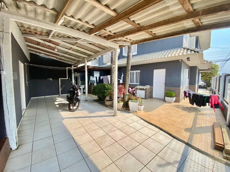 Casa 4 dormitórios em CAPÃO DA CANOA: 14ª foto da galeria de imagens do imóvel