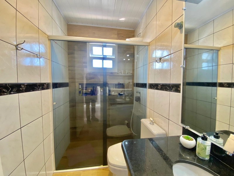 Casa 4 dormitórios em CAPÃO DA CANOA: 15ª foto da galeria de imagens do imóvel