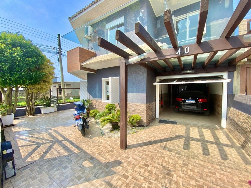 Casa 4 dormitórios em CAPÃO DA CANOA: 16ª foto da galeria de imagens do imóvel