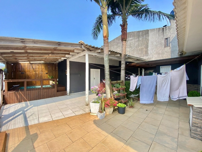 Casa 4 dormitórios em CAPÃO DA CANOA: 13ª foto da galeria de imagens do imóvel