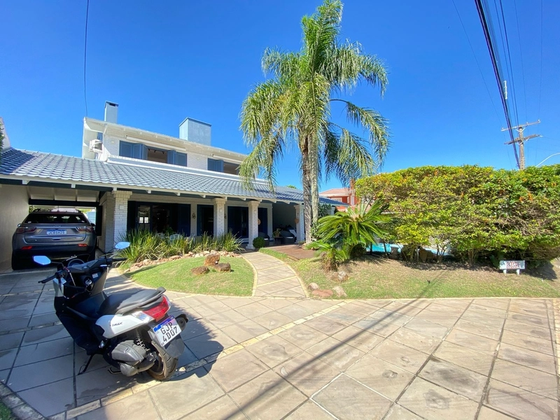CASA EM CONDOMÍNIO FECHADO / XANGRI-LÁ: 2ª foto da galeria de imagens do imóvel