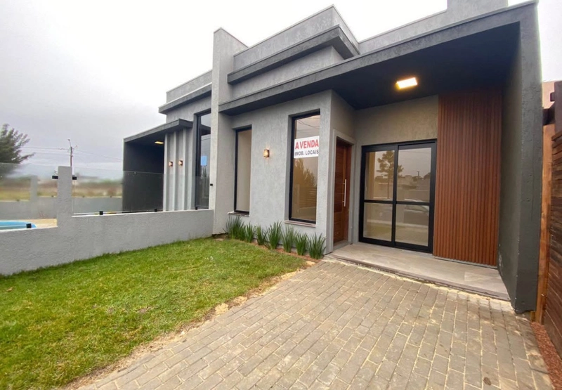 CASA COMPOSTA POR 2 DORMITÓRIOS EM CAPÃO DA CANOA!: 1ª foto da galeria de imagens do imóvel