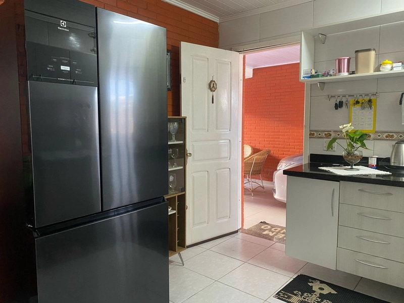 Casa com 3 dormitórios e área de churrasco em bairro de Xangri-lá: 14ª foto da galeria de imagens do imóvel