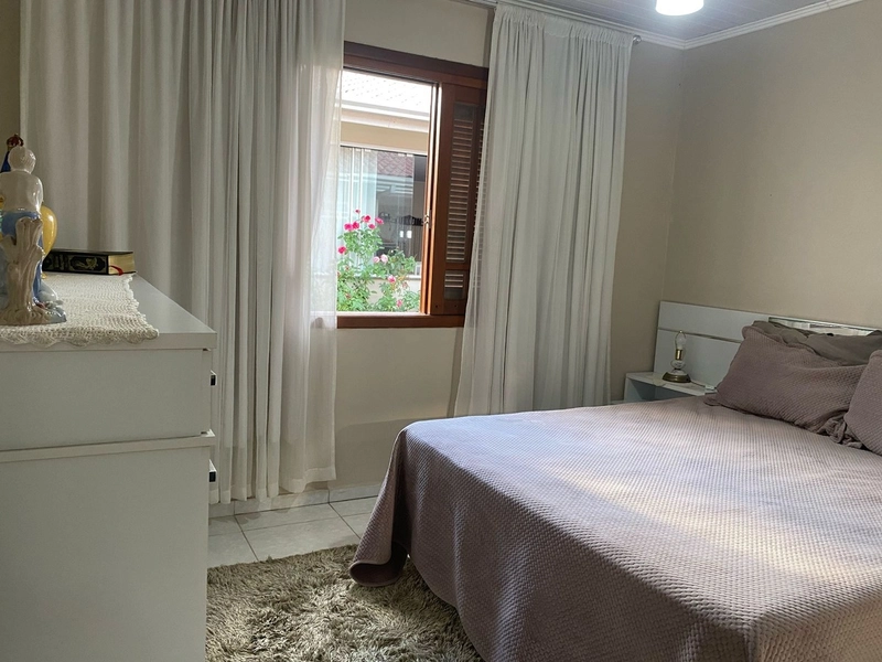 Casa com 3 dormitórios e área de churrasco em bairro de Xangri-lá: 8ª foto da galeria de imagens do imóvel