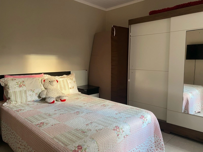 Casa com 3 dormitórios e área de churrasco em bairro de Xangri-lá: 16ª foto da galeria de imagens do imóvel