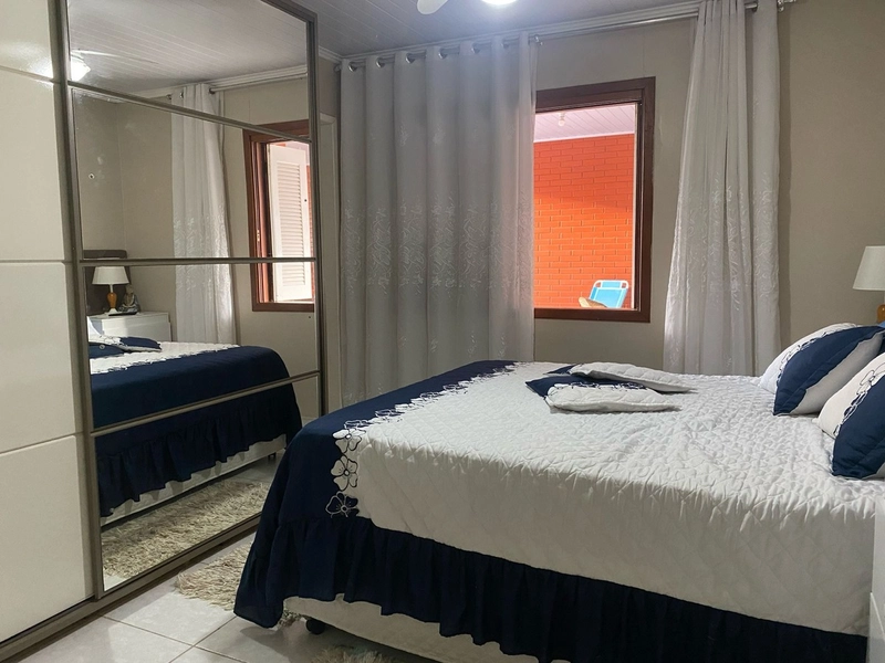 Casa com 3 dormitórios e área de churrasco em bairro de Xangri-lá: 11ª foto da galeria de imagens do imóvel