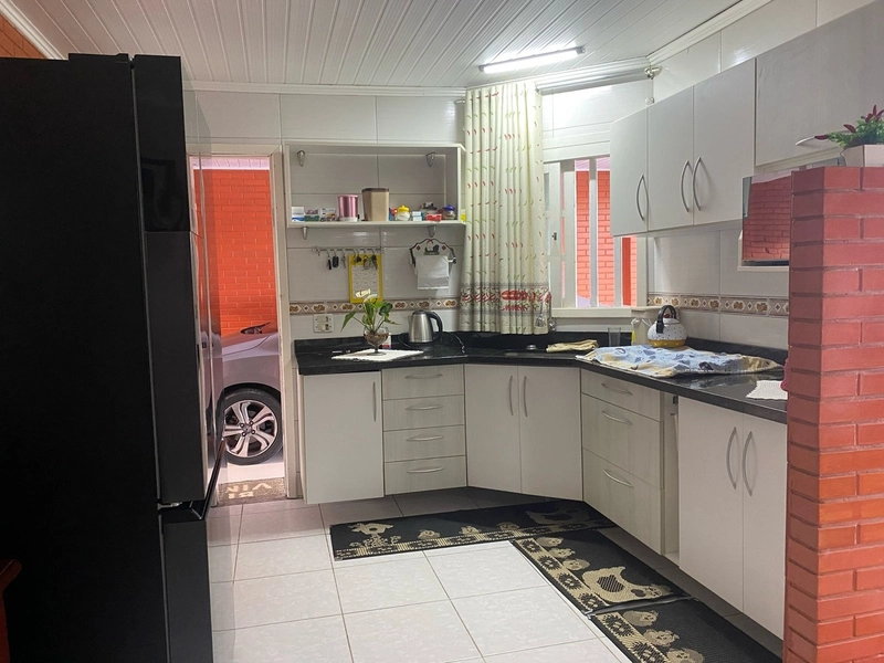 Casa com 3 dormitórios e área de churrasco em bairro de Xangri-lá: 5ª foto da galeria de imagens do imóvel