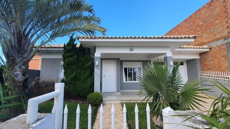 CASA DE TRÊS DORMITÓRIOS EM CAPÃO DA CANOA: 1ª foto da galeria de imagens do imóvel