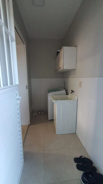 CASA DE TRÊS DORMITÓRIOS EM CAPÃO DA CANOA: 20ª foto da galeria de imagens do imóvel